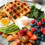 healthy mother’s day brunch ideas with waffles eggs avocado berries greens and fruit