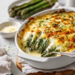 Cheesy Asparagus Bake (Creamy, Golden, and Easy to Prepare) 2 cheesy asparagus bake with melted golden cheese and creamy texture