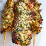 Garlic Parmesan Chicken Skewers coated with parmesan cheese and fresh herbs