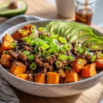 Hot Honey Sweet Potato Beef Bowl That Went Viral 2 Hot Honey Sweet Potato Beef Bowl with roasted sweet potatoes, ground beef, and hot honey drizzle in a bowl