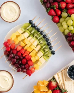 Rainbow Fruit Skewers with strawberries, grapes, pineapple, kiwi, and blueberries