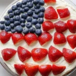 Red White Blue Desserts cake decorated with strawberries and blueberries