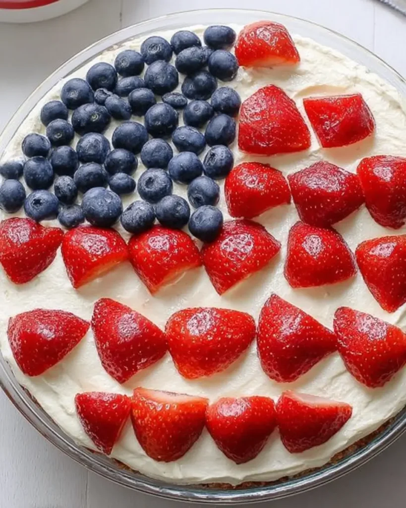 Red White Blue Desserts cake decorated with strawberries and blueberries