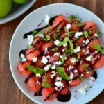 Watermelon Salad with Balsamic Syrup, feta cheese, mint, and red onion
